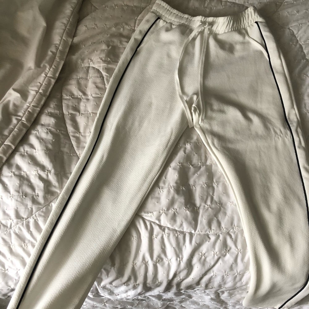 White joggers with black stripe. Casual or work